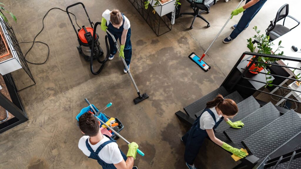 General Cleaning specialist wiping kitchen countertops in a Vancouver residence