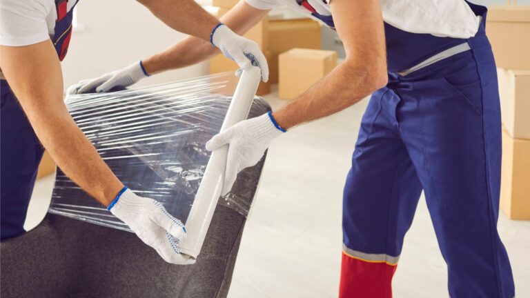 Technician drying water-damaged electronics in a climate-controlled Vancouver storage facility as part of content management
